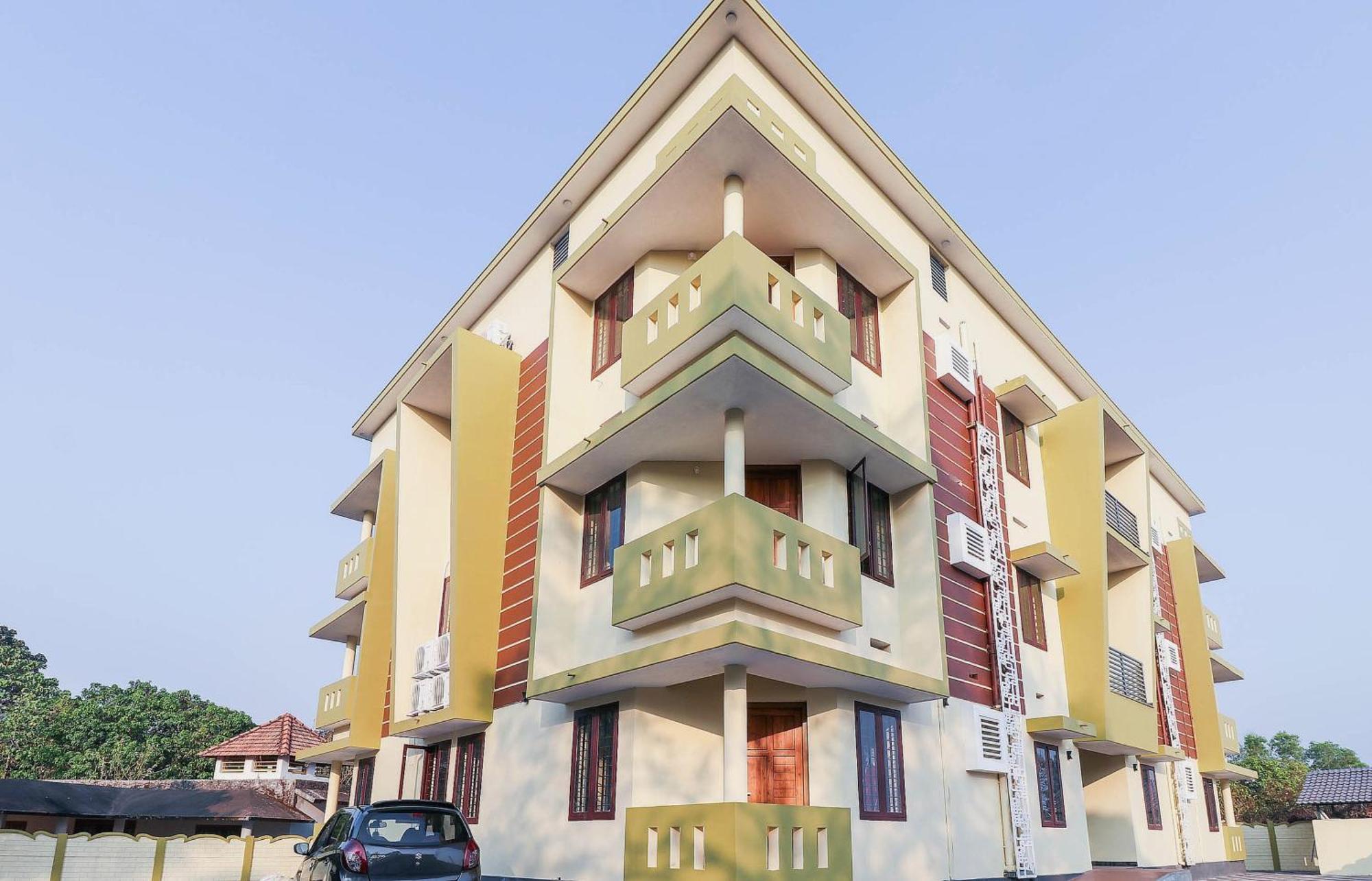 โอโย 71072 ลิเบอร์ตี้ อพาร์ตเมนต์ Hotel Kannur ภายนอก รูปภาพ